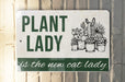 a sign that says plant lady is the new cat lady