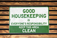 a green and white sign that says good house keeping is everyone's responsibility keep