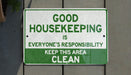 a green and white sign that says good house keeping is everyone's responsibility keep