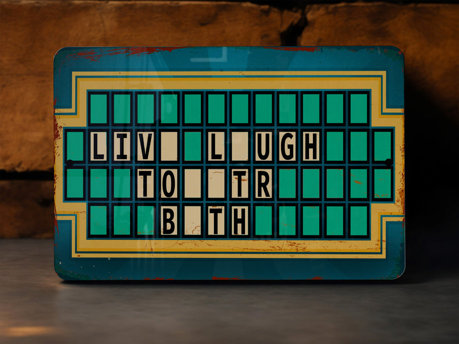 a blue and yellow sign that says live, laugh, laugh, laugh