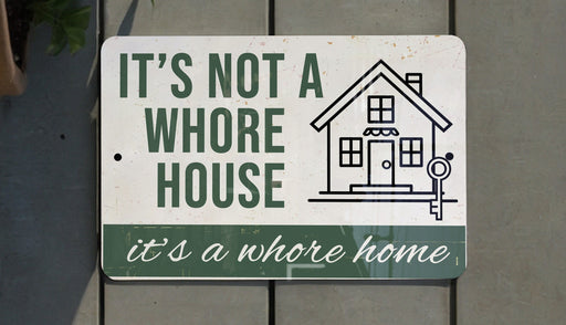 a sign that says it's not a house it's a home