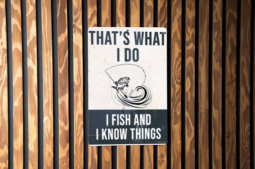 a sign on a wooden wall that says, that's what i do i