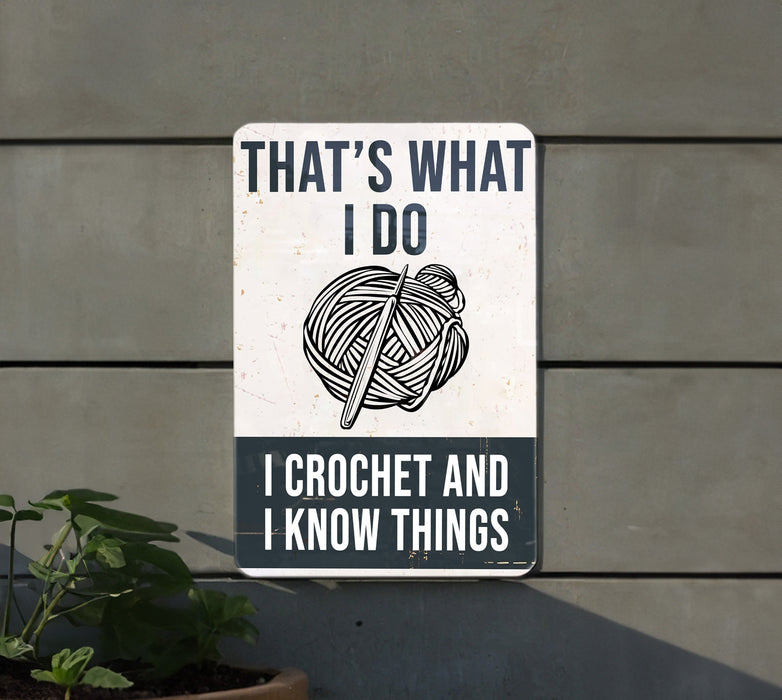 a sign that says that's what i do i crochet and i