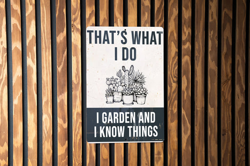 a sign on a wooden fence that says, that's what i do i