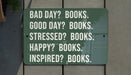 a green sign that says bad day books good day? books stressed? books