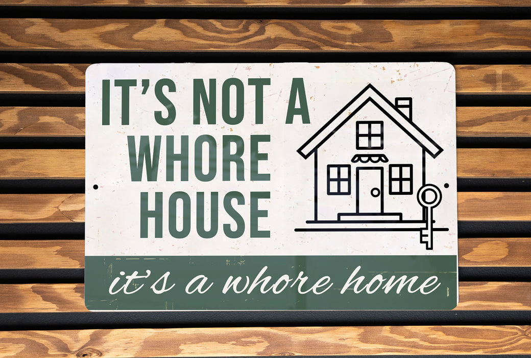 a sign that says it's not a house it's a home