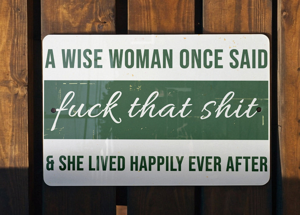 a sign that says a wise woman once said f k that shit and she lived