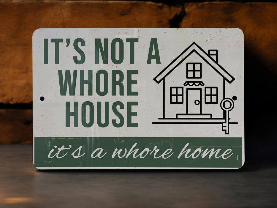 a sign that says it's not a house it's a home