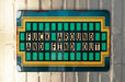 a close up of a sign on a wall