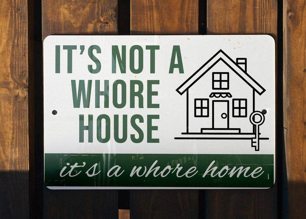 a sign that says it's not a house it's a home