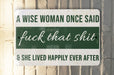 a green and white sign that says a wise woman once said f k that shit