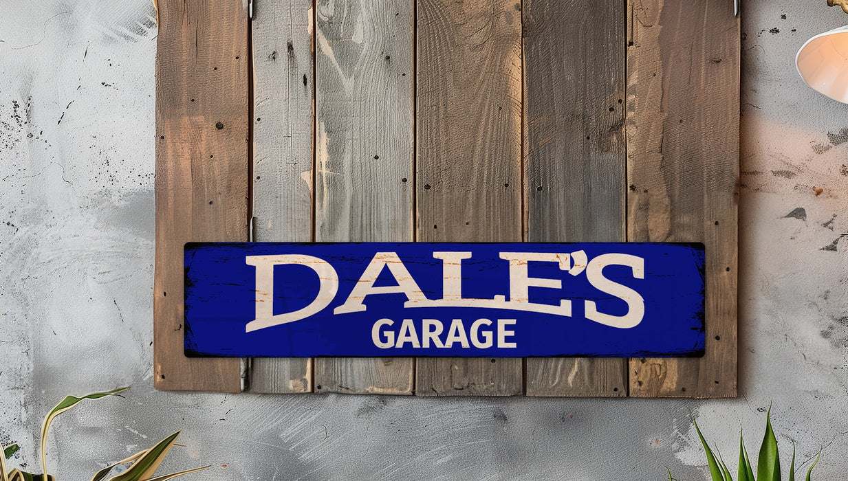 a blue sign that says dale's garage hanging on a wall