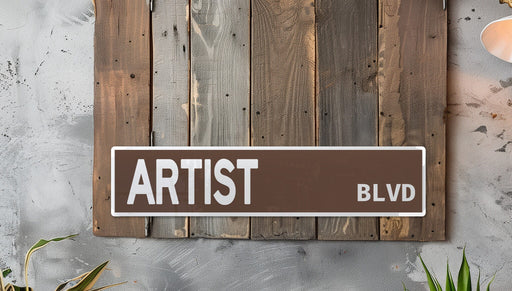 a street sign mounted to the side of a wooden wall