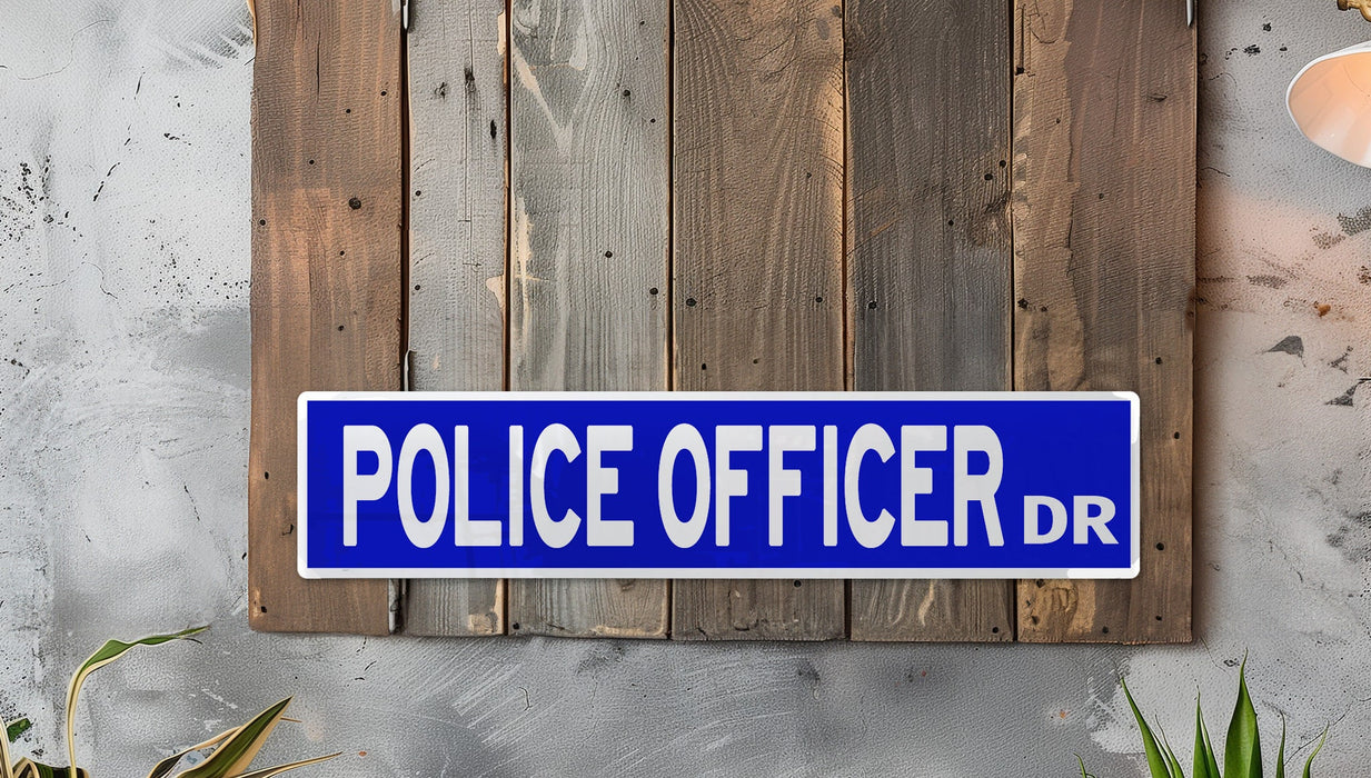 a police officer sign mounted to a wooden wall