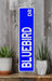 a blue sign sitting on top of a wooden shelf