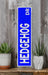 a blue sign sitting on top of a wooden shelf