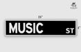 a black and white street sign with the word music on it