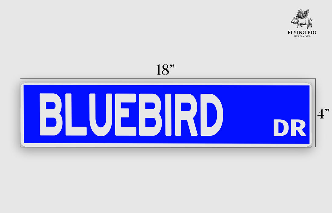 a blue street sign that says bluebird dr
