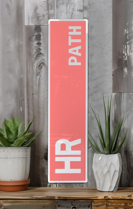 a pink sign that says bath on it