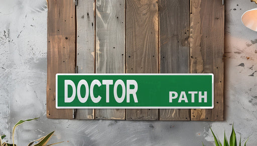 a green and white sign that reads doctor path