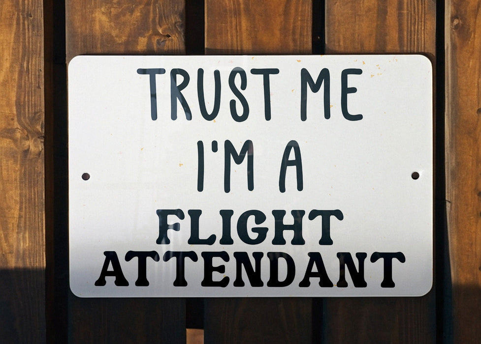 a sign that says trust me i'm a flight attendant