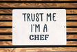 a sign that says trust me i'm a chef