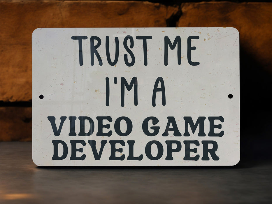 a sign that says trust me i'm a video game developmenter
