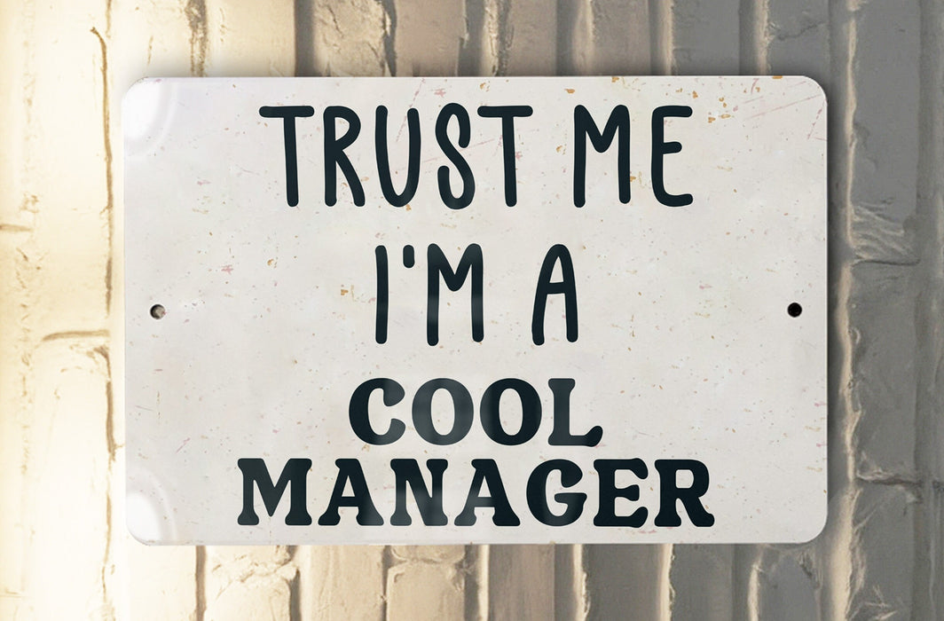 a sign that says trust me i'm a cool manager