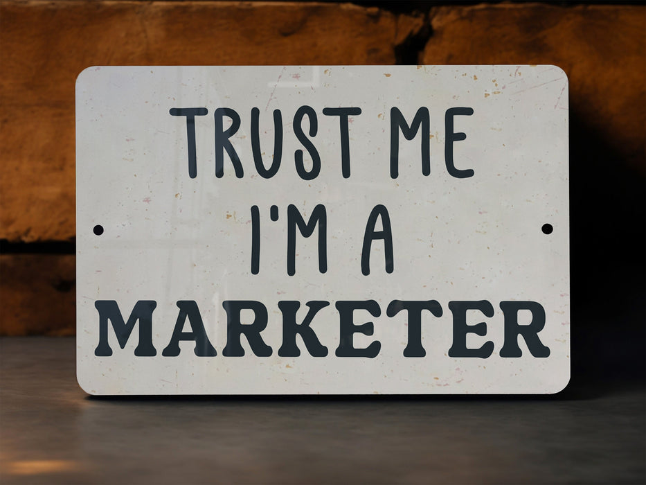 a sign that says trust me i'm a marketer