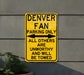a yellow sign that says denver fan parking only all others are unworthyly and