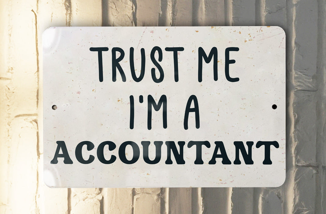 a white sign that says trust me i'm a accountant