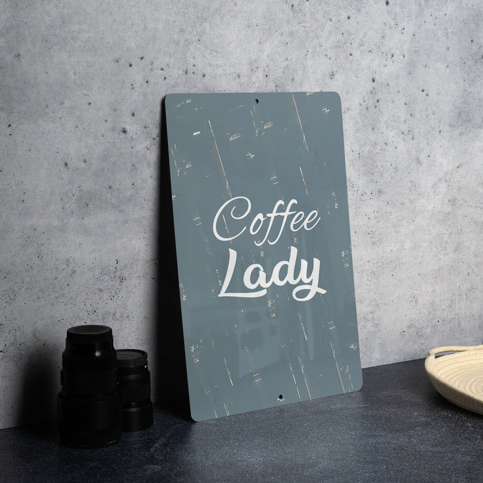 a sign that says coffee lady next to a pair of binoculars