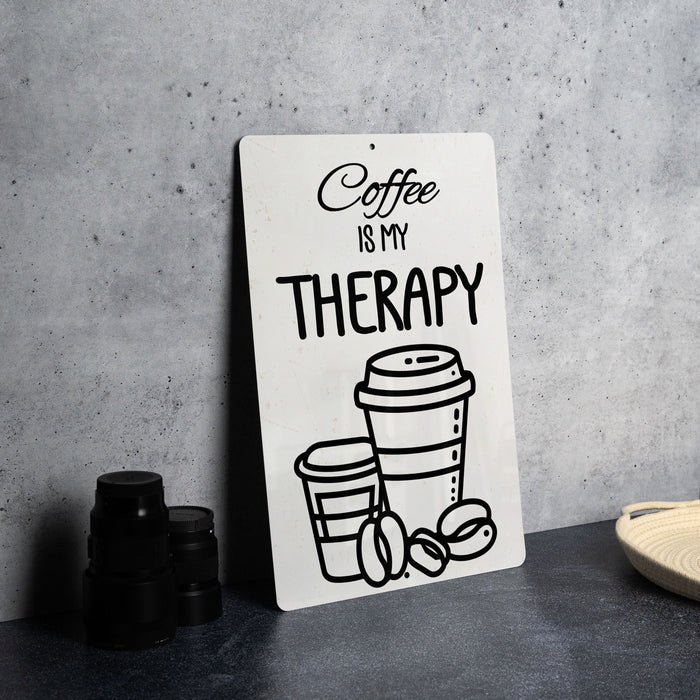 a sign that says coffee is my therapy