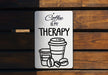 a sign that says coffee is my therapy