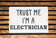 a sign that says trust me i'm a electrician