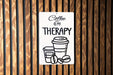 a sign on a wooden wall that says coffee is my therapy