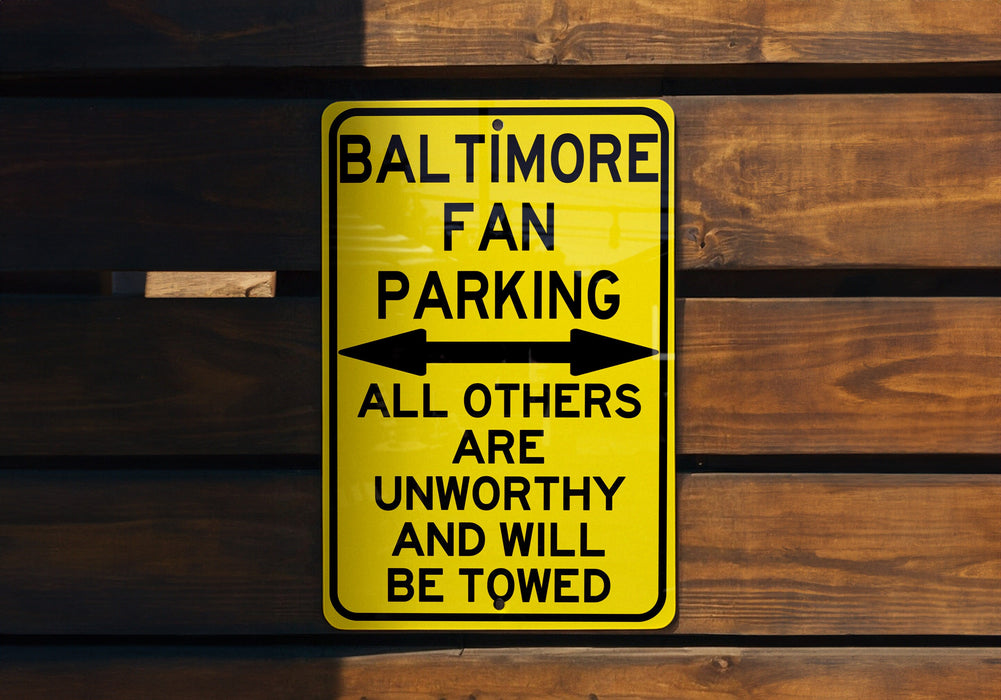 a yellow street sign on a wooden wall