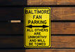 a yellow street sign on a wooden wall