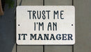 a sign that says trust me i'm an it manager