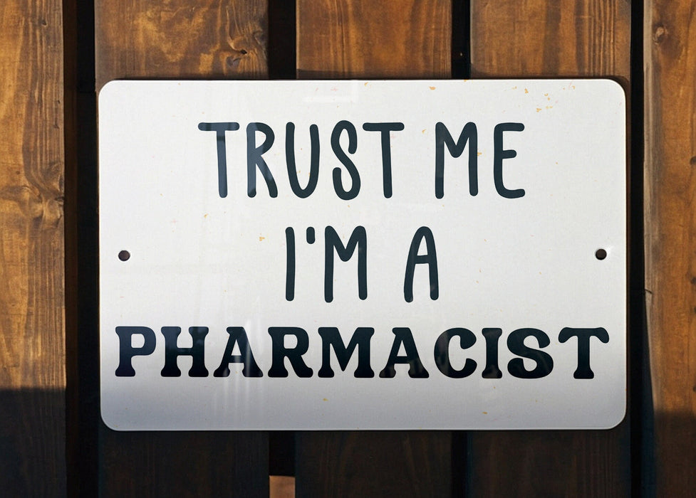 a sign that says trust me i'm a pharmacist