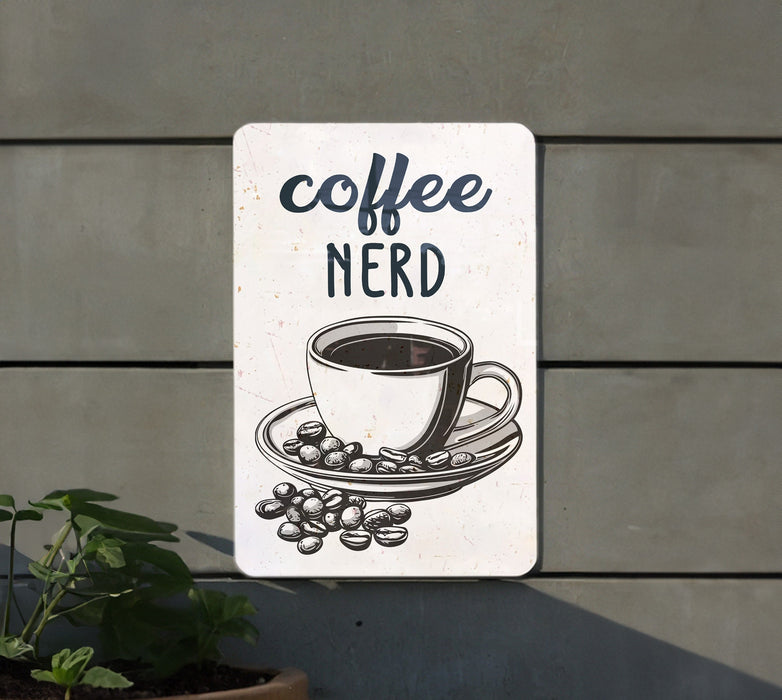 a sign that says coffee nerd with a cup of coffee