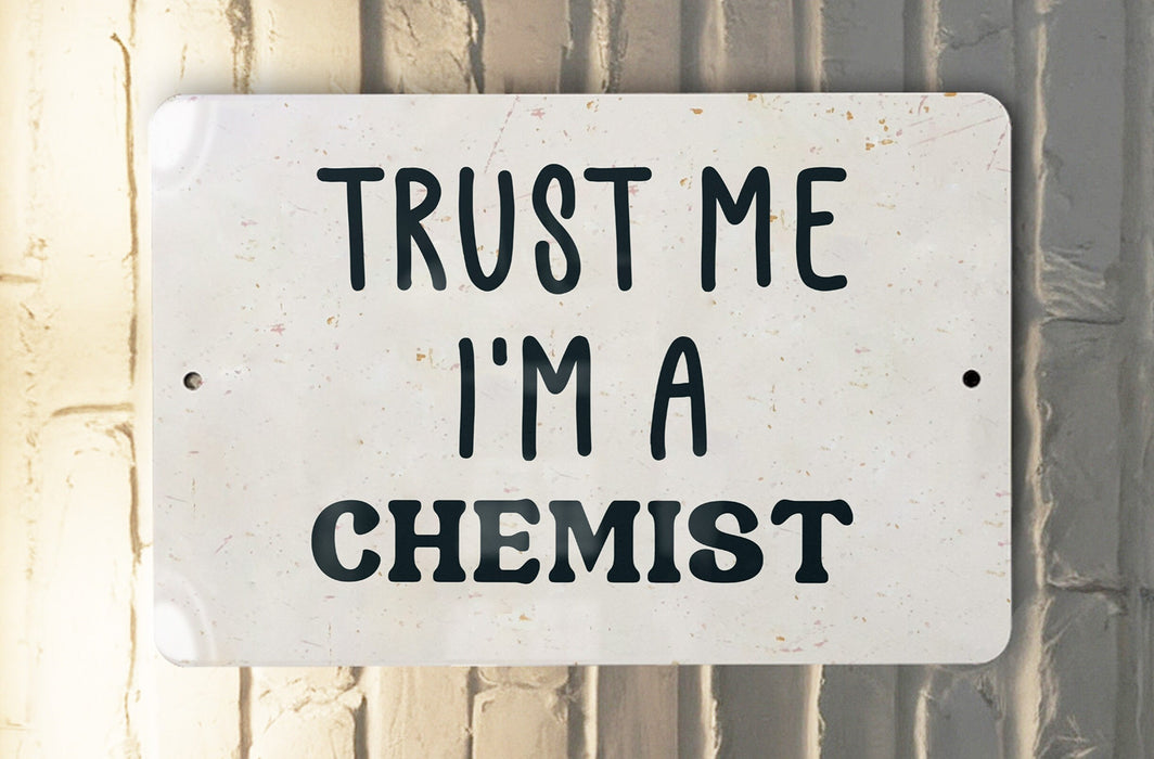 a white sign that says trust me i'm a scientist