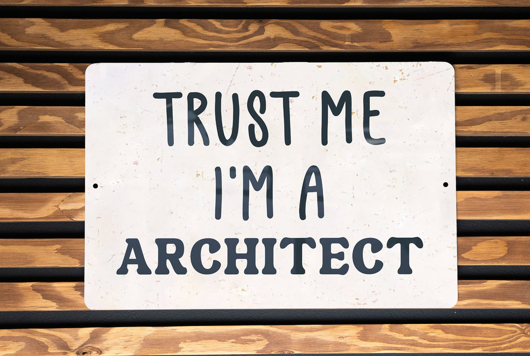 a white sign that says trust me i'm a architecture