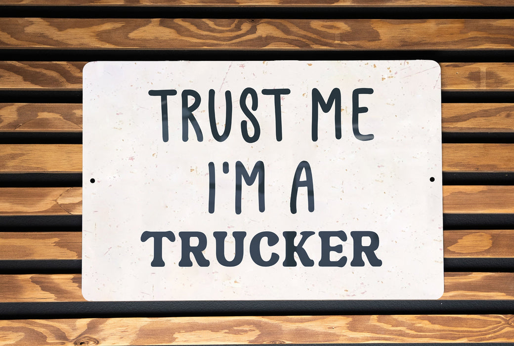 a white sign that says trust me i'm a trucker