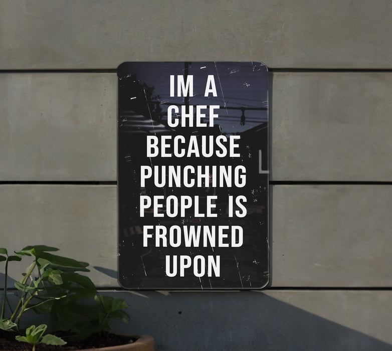 a sign that says i'm a chef because punching people is frowned upon