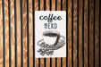 a sign on a wooden wall that says coffee nerd