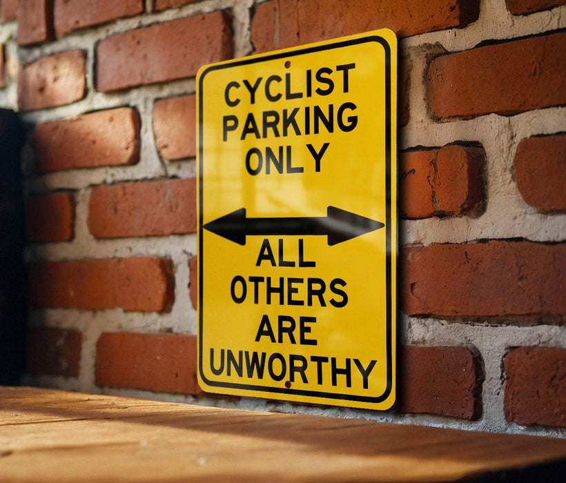 a yellow sign that says cyclist parking only all others are unworthyly