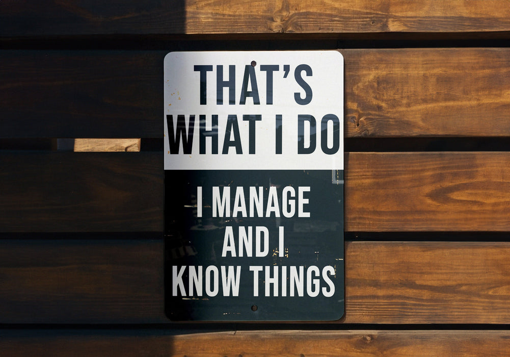 a sign that says that's what i do i manage and i know things