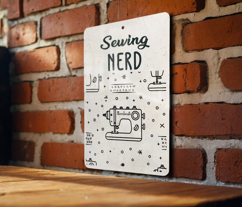 a sign on a brick wall that says sewing nerd