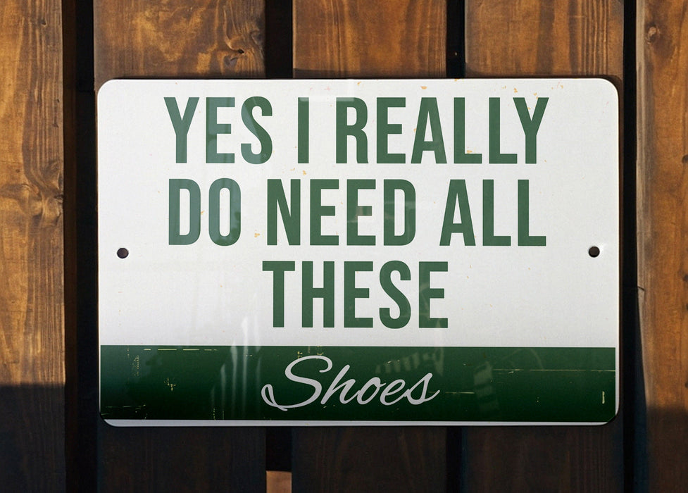 a green and white sign that says, yes i really do need all these shoes